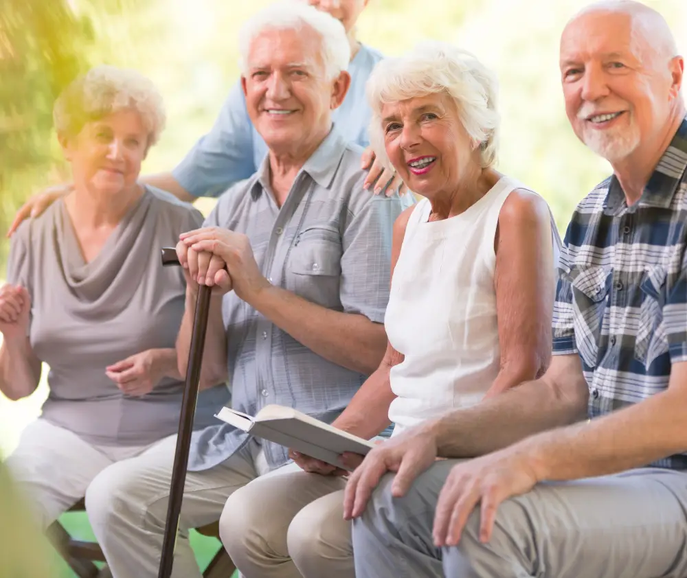 Smiling elderly people spending time together at the patio of nursing house Smiling elderly people spending time together at the patio of nursing house